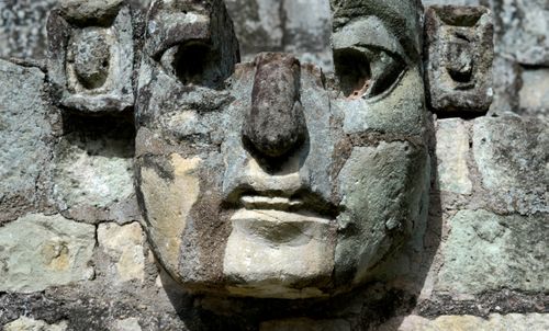 A facial stone carving at the ancient Mayan site of Copan, Honduras. (Photo: AP).
