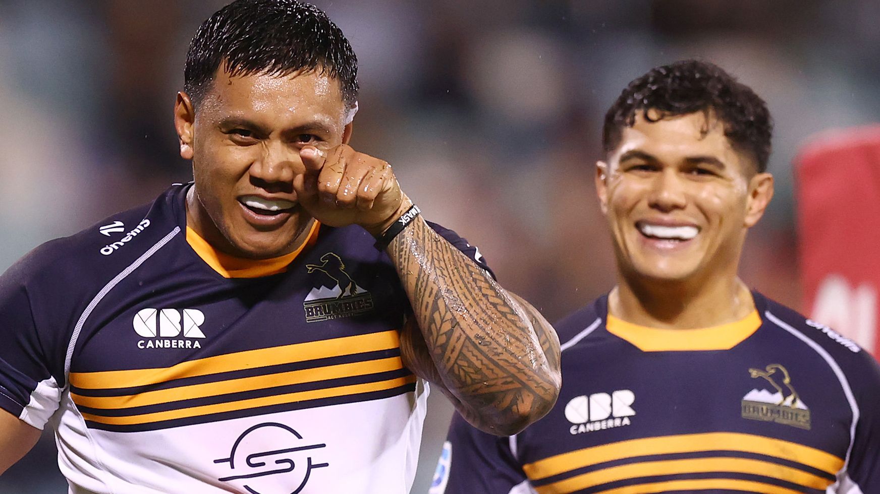 Len Ikitau of the Brumbies celebrates scoring a try during the round 11 Super Rugby Pacific match between ACT Brumbies and Fijian Drua.