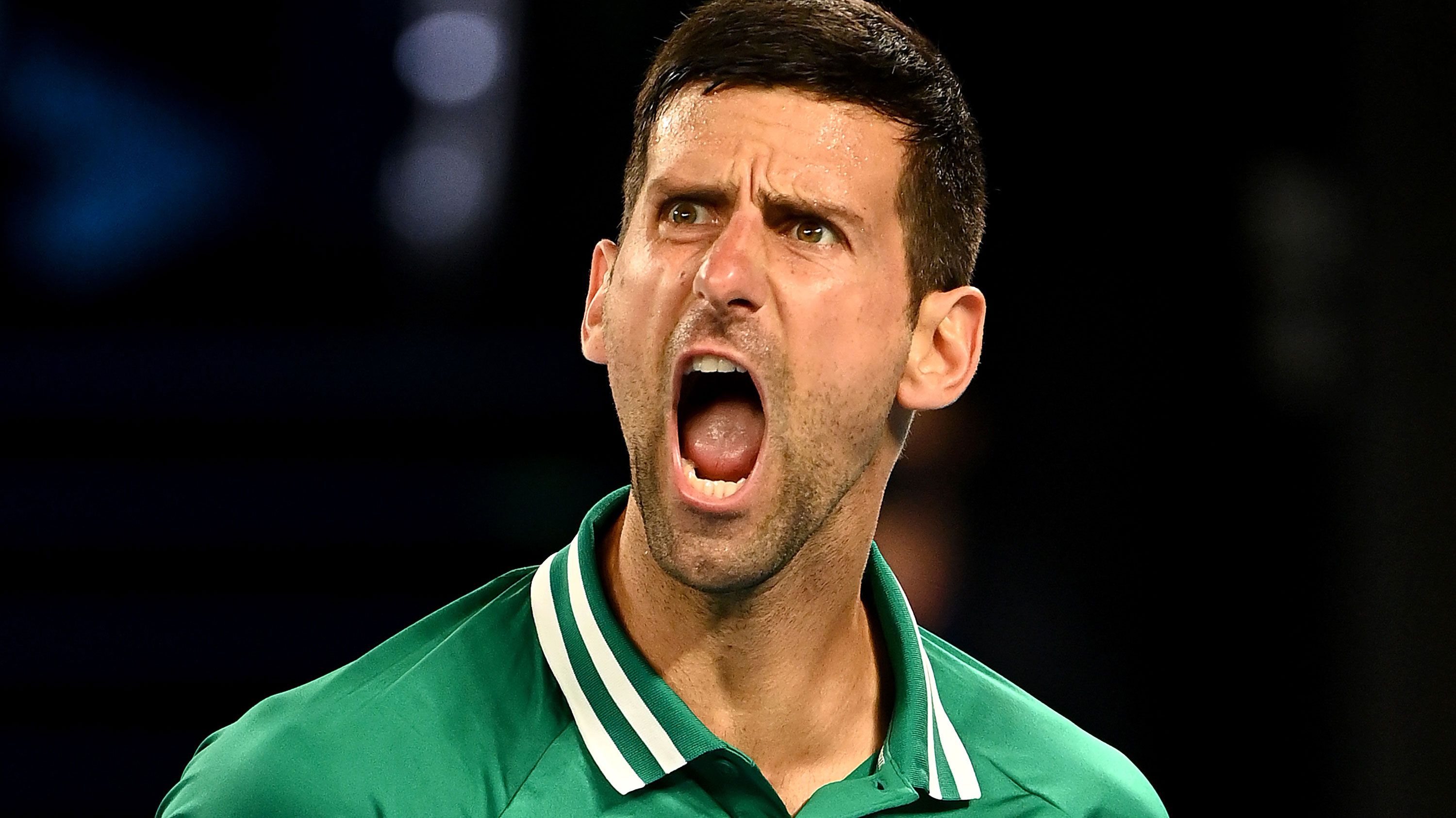 Novak Djokovic yells at the Rod laver Arena crowd.
