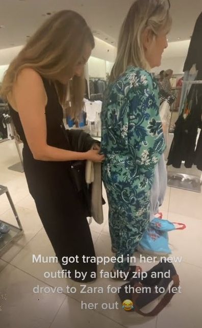 Woman stuck in jumpsuit Zara