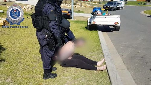 A high ranking member of the Finks bikie gang was arrested at the scene, as was a woman. Picture: NSW Police