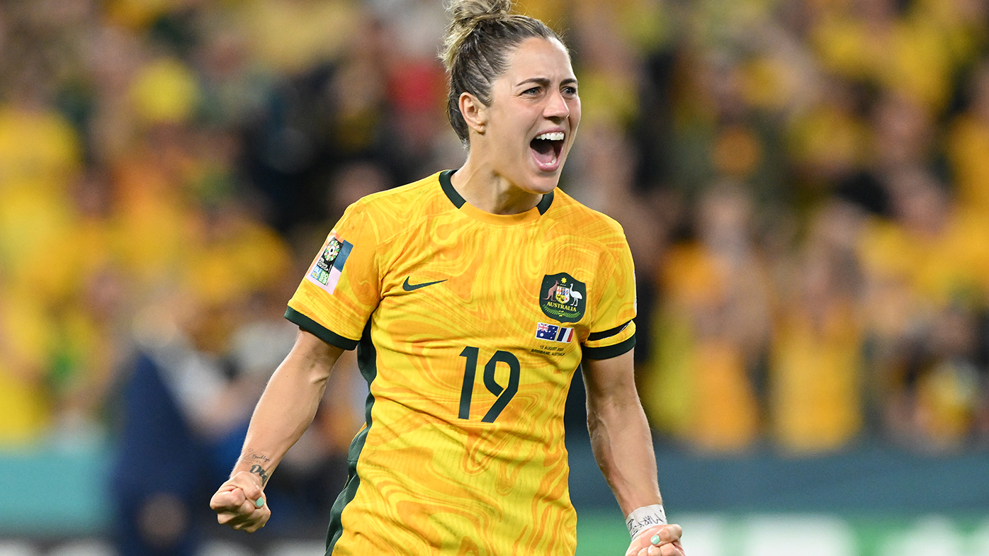 Katrina Gorry celebrates after scoring Australia&#x27;s sixth penalty during the team&#x27;s penalty shootout against France.