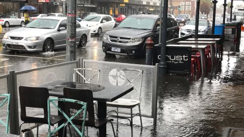 Sodden scenes on Bay Street, in Port Melbourne. (Melanie Larkin)