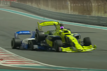 Two AI-controlled cars collide at the Yas Marina Circuit.