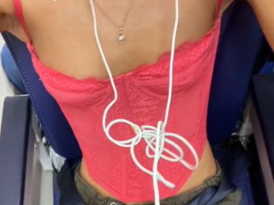 Woman kicked off flight for outfit