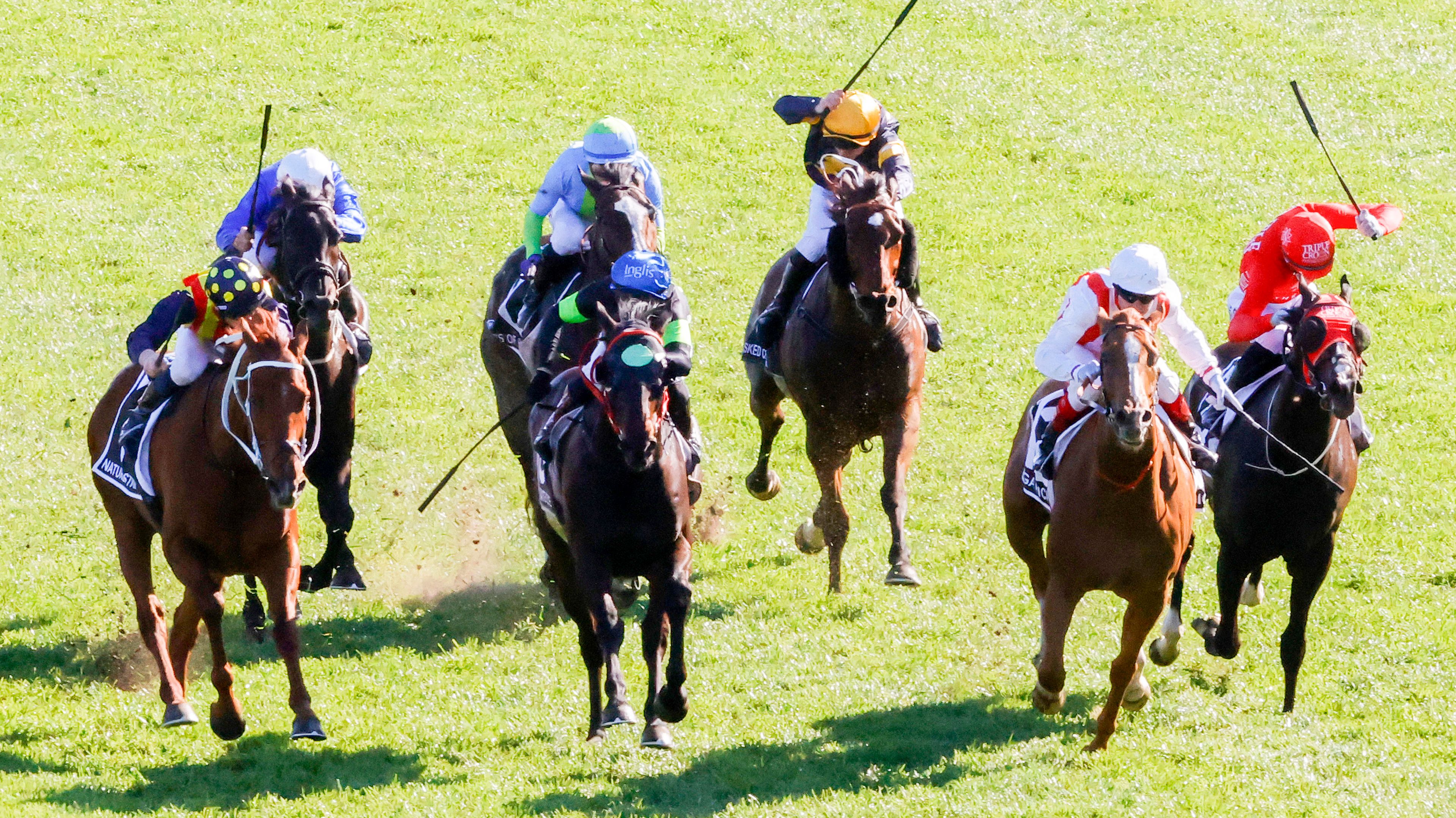 Craig Williams (red and white) on Giga Kick wins race 7 The Tab Everest during Everest Day at Royal Randwick Racecourse on October 15, 2022 in Sydney, Australia. (Photo by Jenny Evans/Getty Images)