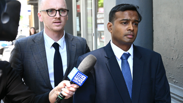 David Maria Anthony Rayan leaves the Melbourne Magistrates court 