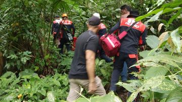 Heavy rain and risk of landslides have added difficulty to the search.