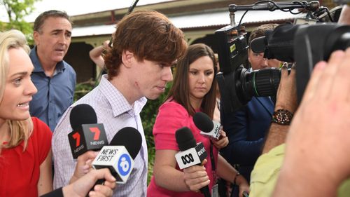 Mr Munday was swarmed by reporters as he left the court.