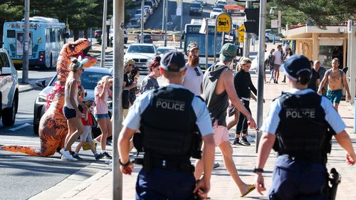 Police in Sydney patron Coogee Beach in Sydney on Easter Sunday, April 12, 2020.