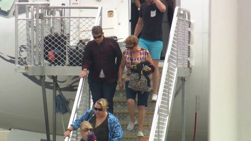 Renae Lawrence exits a Virgin Air flight in her home town of Newcastle.