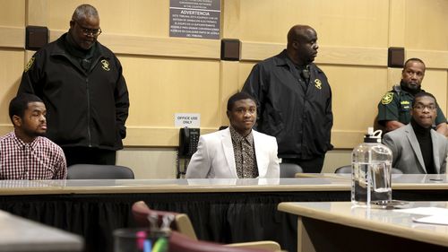 Trayvon Newsome, left, Dedrick Williams and Michael Boatwright were found guilty of first-degree murder of  XXXTentacion at the Broward County Courthouse in Fort Lauderdale on Monday, March 20, 2023. (Carline Jean/South Florida Sun-Sentinel via AP, Pool)