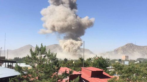 A plume of smoke rises over Kabul after the explosion. (Aditya Raj Kaul)