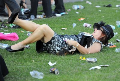 It was all too much for one lady, who had to take a moment at Flemington outer. (AAP)