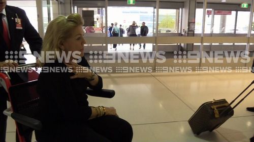 Ms Packer did not comment to media at the airport. (9NEWS)