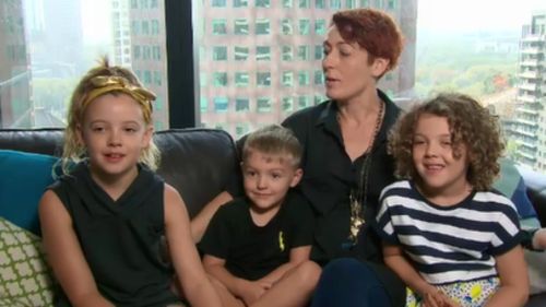 Michelle Coleman and her three children live in the Eureka Tower. (9NEWS)