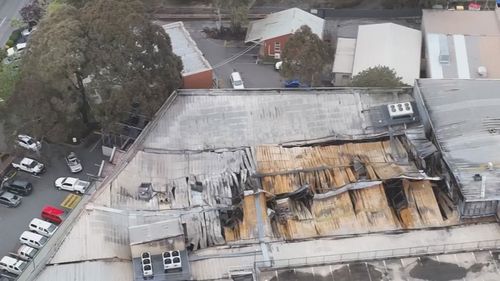 Aerial photos show the extent of damage to the roof of the building. Woolworths fire Adelaide Stirling