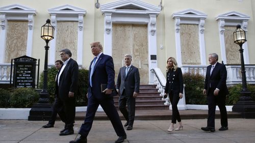 President Donald Trump departs after visiting outside St John's Church across Lafayette Park from the White House on June 2.