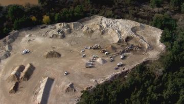 The worker was onsite at a quarry in Emu Plains and has been taken to hospital.