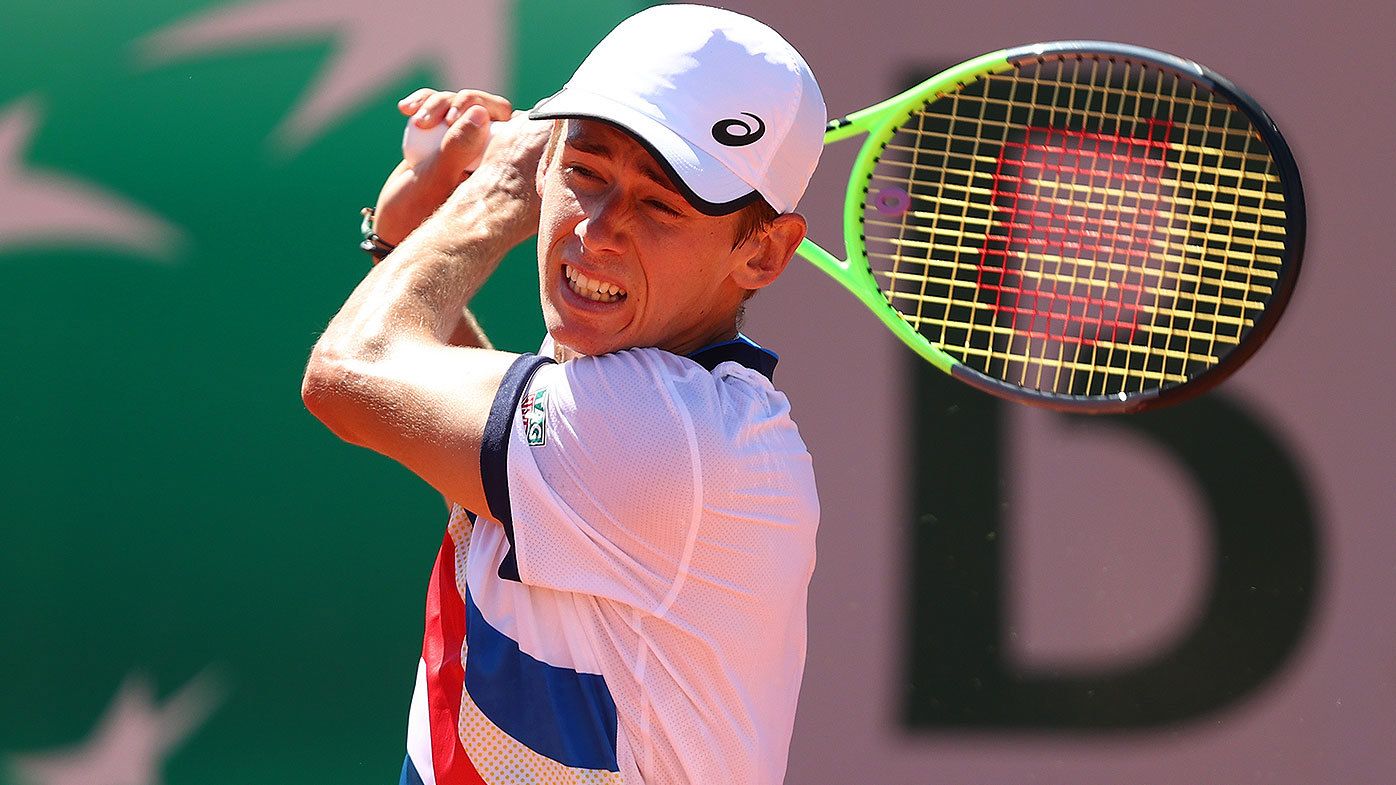 Alex de Minaur of Australia plays a backhand in their mens first round match against Stefano Travaglia of Italy during day three of the 2021 French Open at Roland Garros on June 01, 2021 in Paris, France. (Photo by Julian Finney/Getty Images)