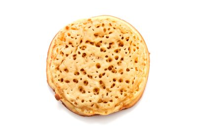 Two crumpets with thick-spread peanut butter and 250ml glass
of milk