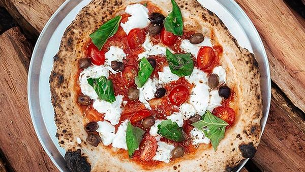 Happy as Larry's wood-fired Neapolitan margherita pizza