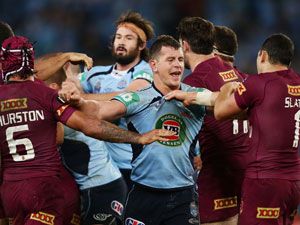 NSW and Queensland players tangle in Origin II. (Getty)