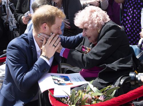 Daphne Dunne, a 98-year-old war widow who stole Harry's heart on two previous visits today met his wife Meghan.