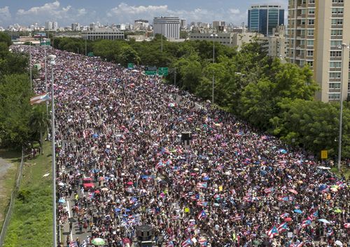 Puerto Ricans march on the Las Americas expressway calling for Puerto Rican governor Ricardo "Ricky" Antonio Rossello Nevares' resignation following the release of leaked private chats.