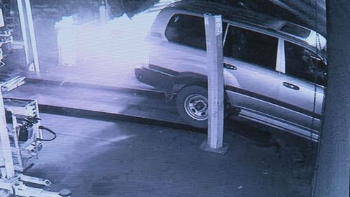 An investigation is underway after a car was used to break into two Adelaide businesses.