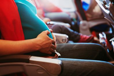 pregnant woman travel by plane, flying in pregnancy