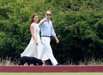 WINDSOR, UNITED KINGDOM - JULY 06: (EMBARGOED FOR PUBLICATION IN UK NEWSPAPERS UNTIL 24 HOURS AFTER CREATE DATE AND TIME) Catherine, Duchess of Cambridge and Prince William, Duke of Cambridge, with their dog 'Orla', attend the Out-Sourcing Inc. Royal Charity Polo Cup at Guards Polo Club, Flemish Farm on July 6, 2022 in Windsor, England. (Photo by Max Mumby/Indigo/Getty Images)