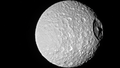 Saturn's 'Death Star' moon could have a watery secret