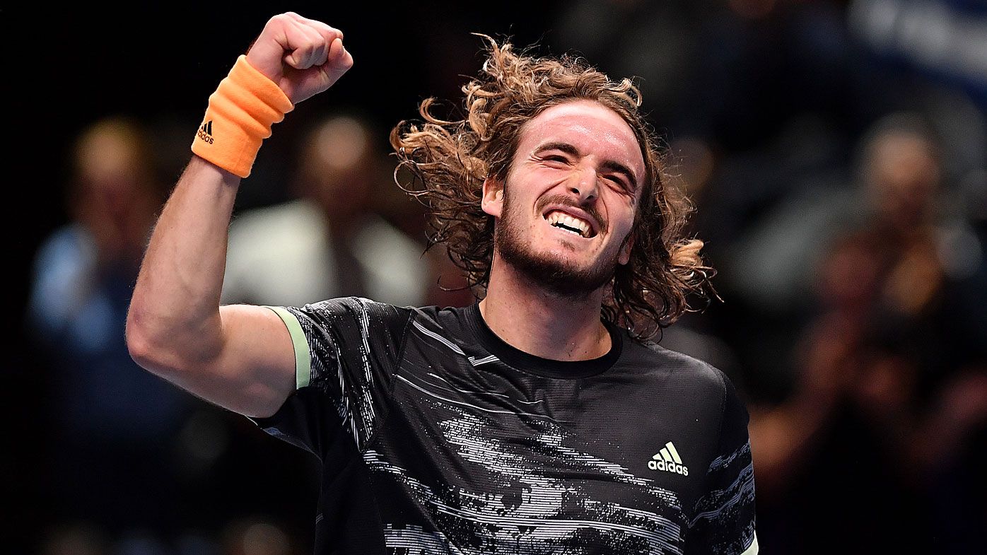  Stefanos Tsitsipas of Greece celebrates victory after his singles match against Daniil Medvedev 