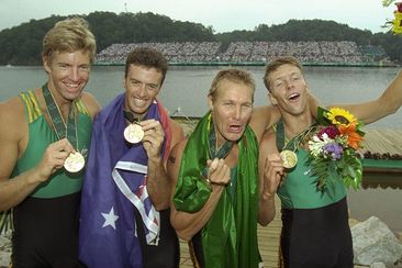 From left: James Tomkins, Nick Green, Mike McKay and Drew Ginn celebrating winning gold at the Atlanta 1996 Olympics.