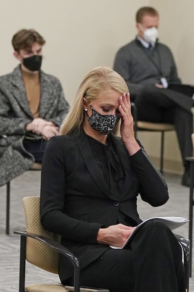 Paris Hilton wipes her eyes after speaking at a committee hearing at the Utah State Capitol, Monday, Feb. 8, 2021, in Salt Lake City. 