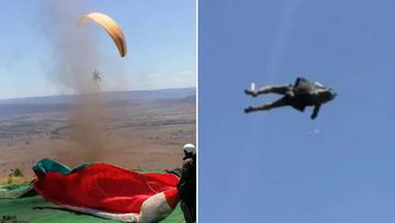 A man preparing to set off on a paragliding trip has received the fright of his life after a dust devil formed and swept him over a cliff.