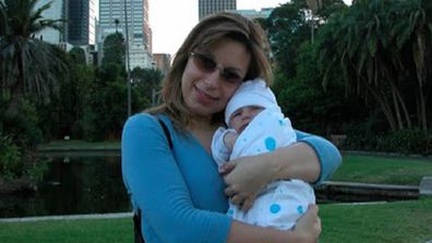 Jo Abi with her first child in 2004.