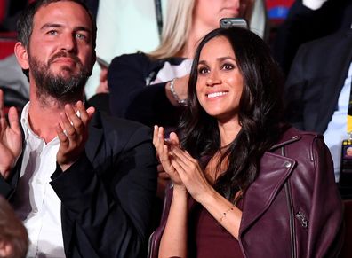 Meghan Markle at the opening ceremony of the Invictus Games at the Toronto Canada Center on September 23, 2017, with Soho House consultant Markus Anderson.