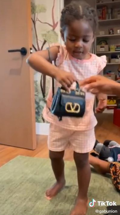 Gabrielle Union's daughter Kaavia receives designer bag.