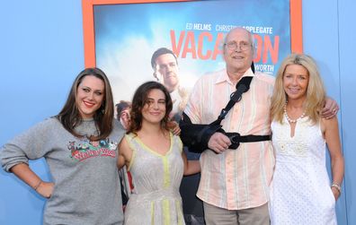 Emily Evelyn Chase, Caley Leigh Chase, Chevy Chase and Jayni Chase arrive at the Premiere Of Warner Bros. 'Vacation' at Regency Village Theatre on July 27, 2015 in Westwood, California.