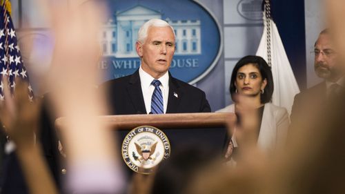 Mike Pence addresses reporters in the White House press briefing room.