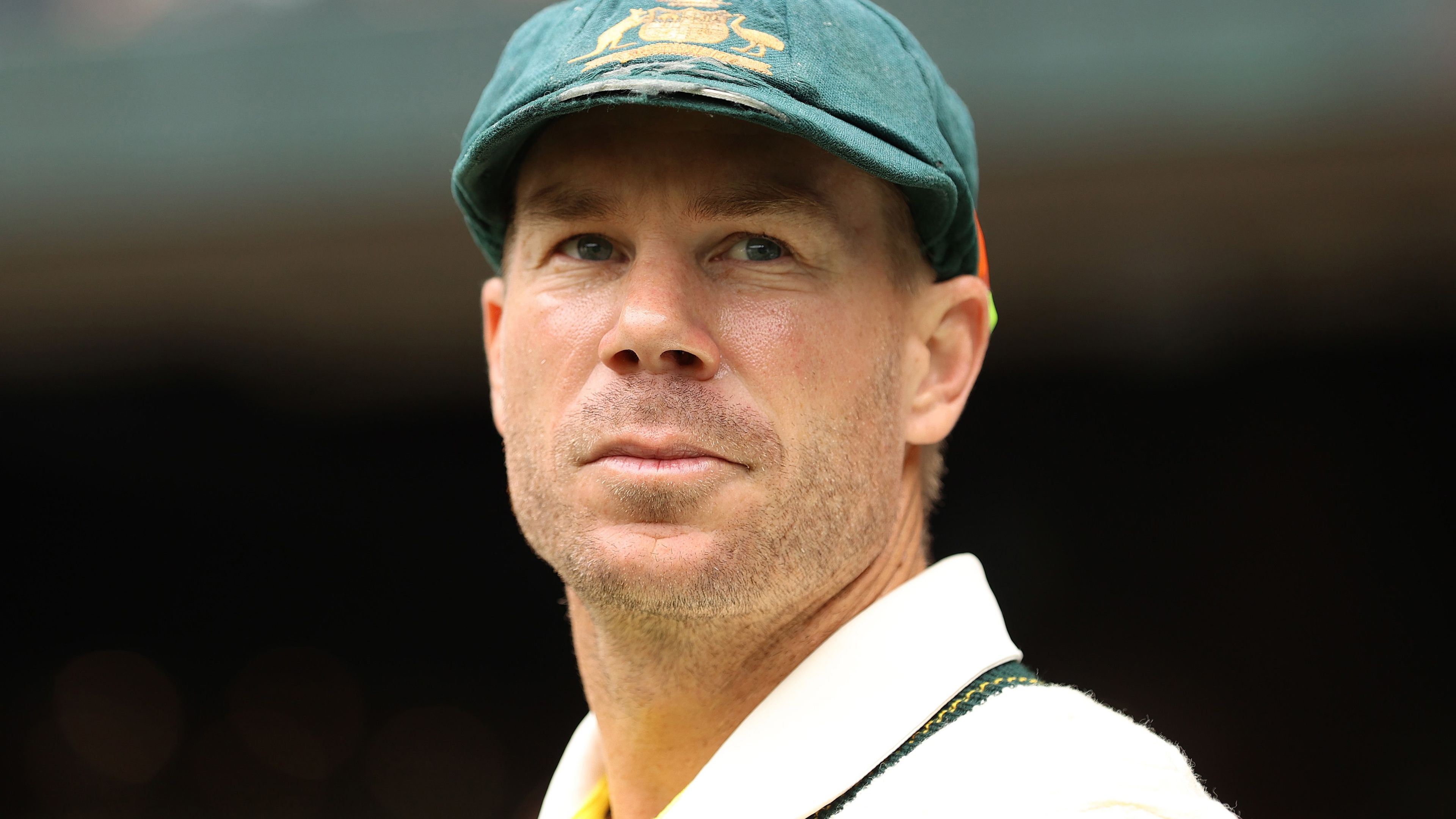 David Warner looks on before the national anthem prior to day one of the Third Test match in the Ashes series between Australia and England at Melbourne Cricket Ground