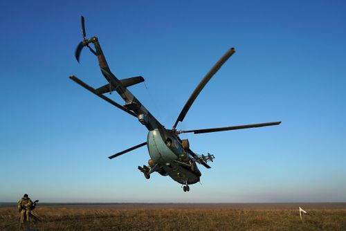 A Ukrainian military helicopter MI-8 takes off near Urzuf, south coast of Azov sea, eastern Ukraine.