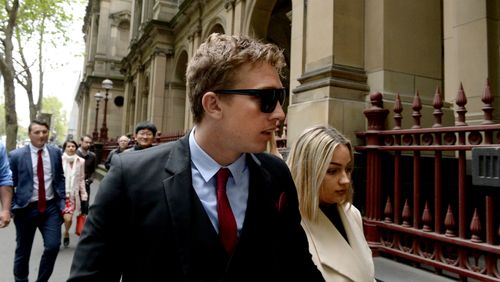 Richard Vincec (centre) arrives to his plea hearing at the Supreme Court in Melbourne.