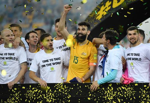 The Australia players celebrate winning the 2018 FIFA World Cup Intercontinental play-off football match. (AAP)