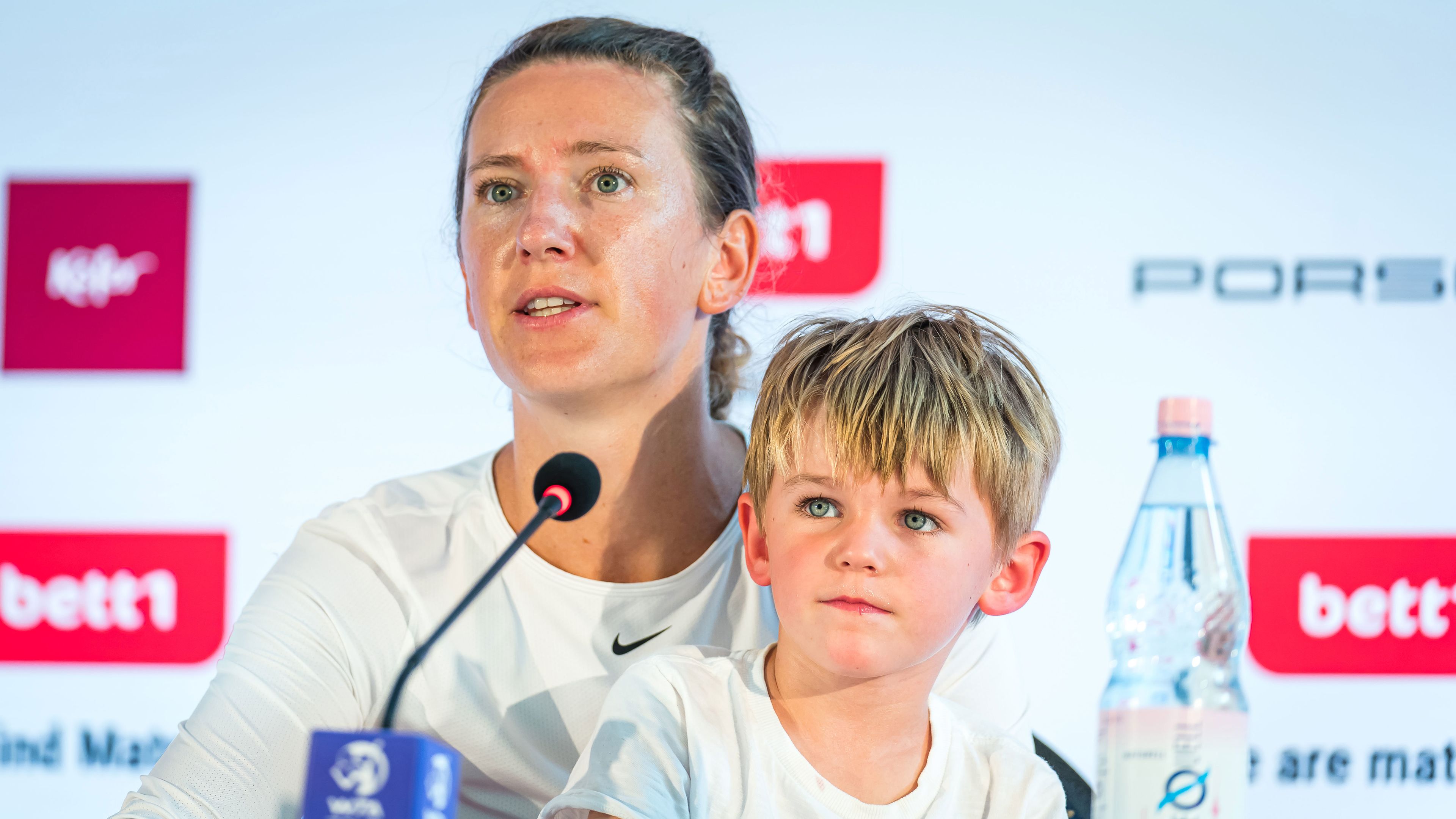 Victoria Azarenka of Belarus holds son Leo Azarenka during a press conference in 2021.