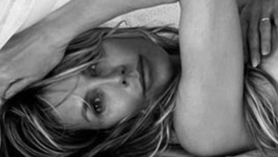 Heidi Klum shares nude selfie from bed.