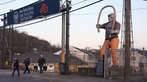 Workers at the United States Steel Corporations Edgar Thomson Plant end their shift at the plant on Tuesday, March 4, 2025, in Braddock, Pa. (AP Photo/Gene J. Puskar)