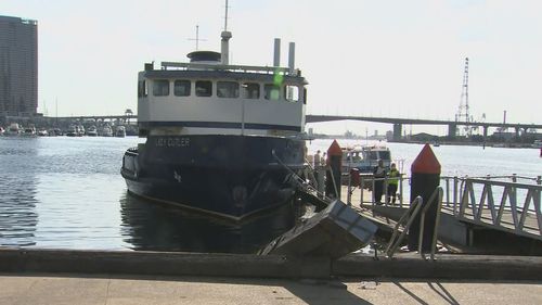 Authorities are investigating after several people on a party boat were injured after it crashed into a dock in Melbourne.Five people including a young boy were taken to hospital with minor injuries